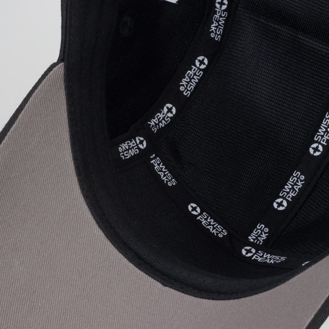 A five-panel cap in grey and black with an inner lining featuring a logo.