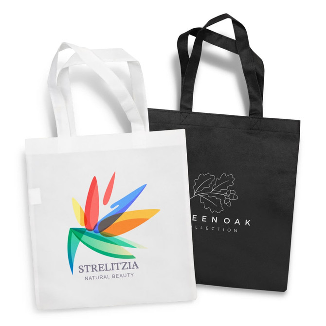 A white tote bag with a multicoloured floral design and a black tote bag featuring a logo.