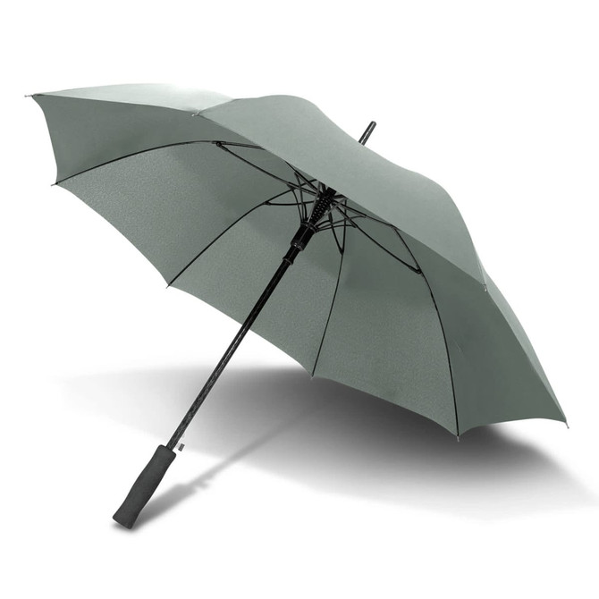 A large green umbrella with a black handle and a sturdy frame, featuring an umbrella logo on the handle.