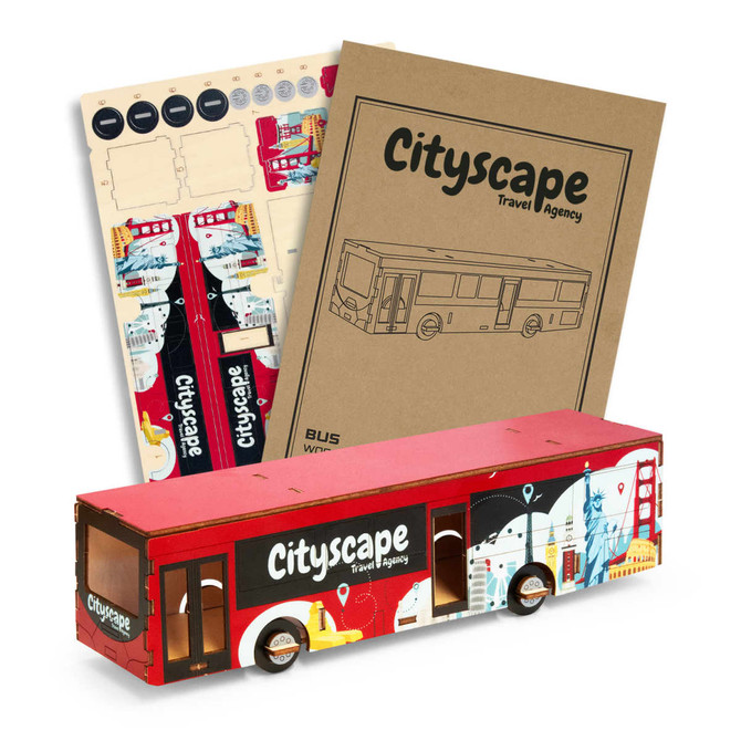 A wooden bus model in red and blue, featuring various city landmarks and a logo on the side, alongside design sheets.