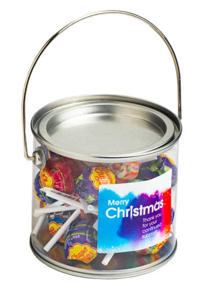 A medium silver PVC bucket filled with colourful lollipops, featuring a handle and a branding label.