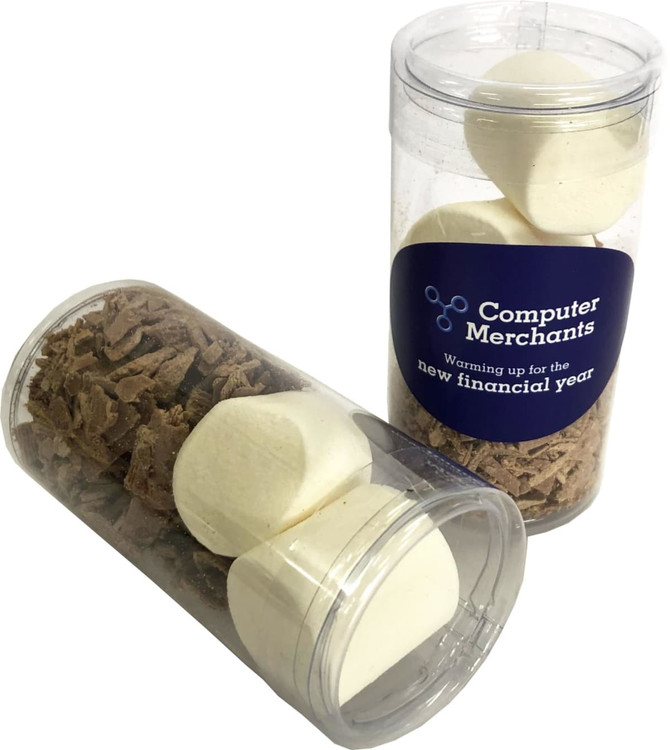 A clear tube containing chocolate shavings and large, white marshmallows, featuring a logo on the side.