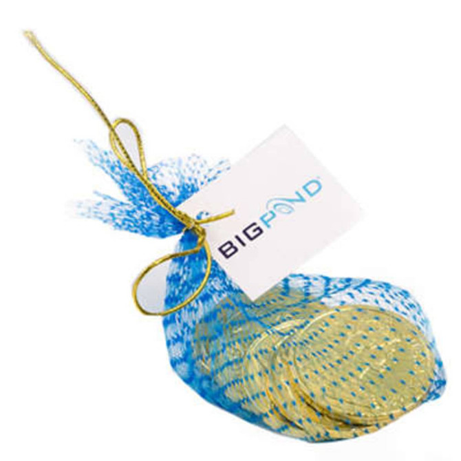 A mesh bag containing six gold chocolate coins, tied with a golden ribbon and featuring a branding tag.