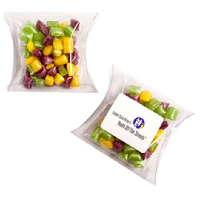 A clear pillow pack containing colourful humbugs in purple, green, and yellow shades. The pack features a logo.