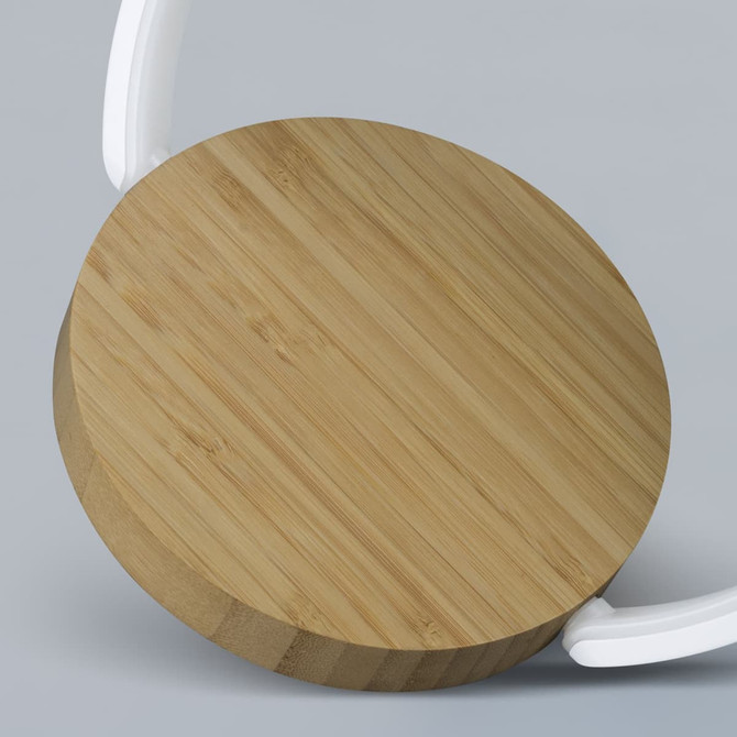 A circular wireless charging night light with a bamboo wood top and a white base. It features a sleek, modern design.