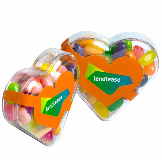 Acrylic heart-shaped container filled with colourful JELLY BELLY jelly beans, featuring a logo.