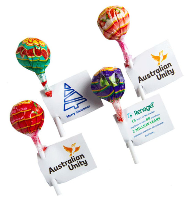 Lollipops in vibrant colours, each with a tag, featuring various designs and including branding elements.