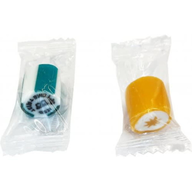 Individually wrapped rock candies in teal and yellow, each sealed in clear plastic packaging.