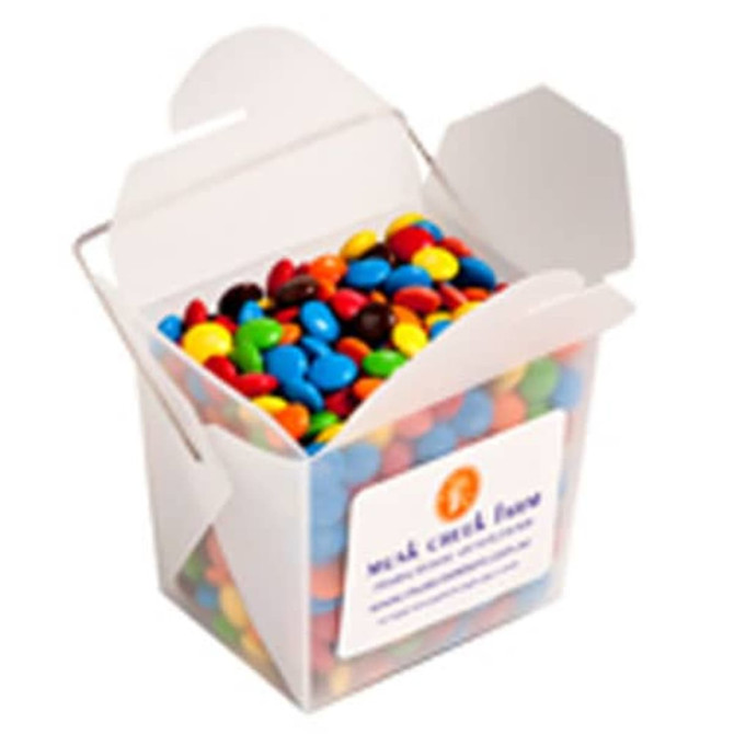 A frosted noodle box filled with colourful chocolate beans, featuring various shades of red, blue, yellow, green, and brown.