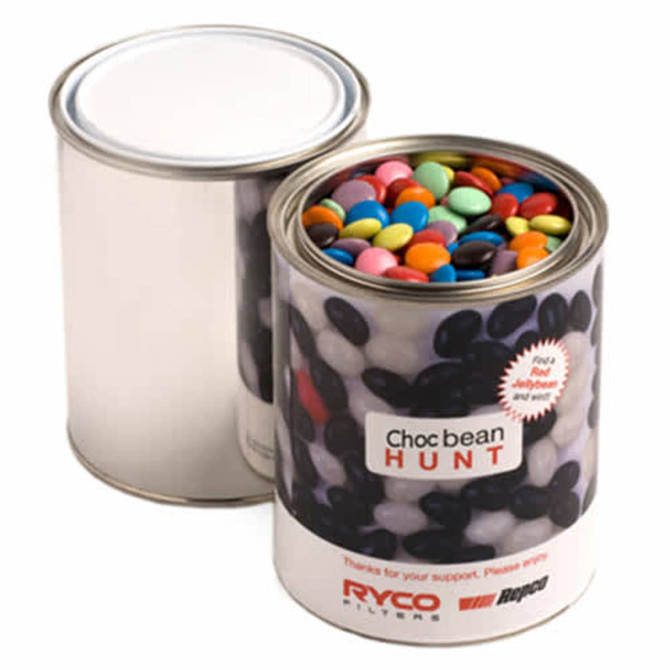 A tin filled with colourful choc beans, featuring a sleek silver exterior and a clear lid.