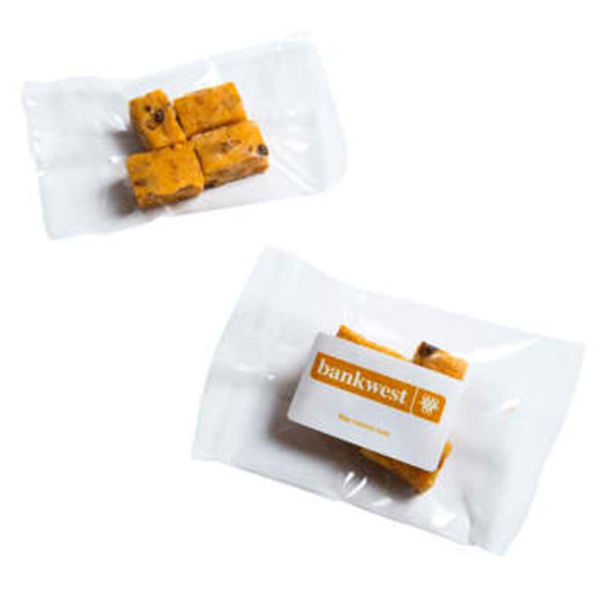 Apricot Bites in a clear pack, featuring orange and yellow hues, with a branding label.