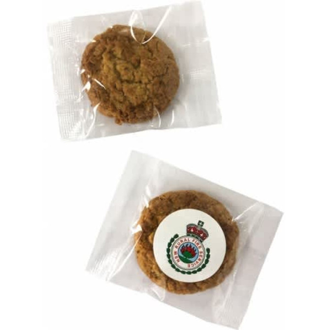Mixed biscuits individually wrapped in clear cellophane, featuring a light brown colour and a logo on one pack.