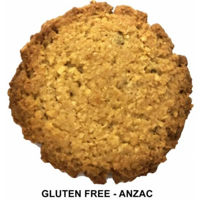 A round gluten-free biscuit with a golden-brown texture, featuring a rustic, crumbly appearance.
