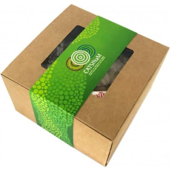 A small kraft gift box with a green and patterned band, featuring a transparent window to view contents.