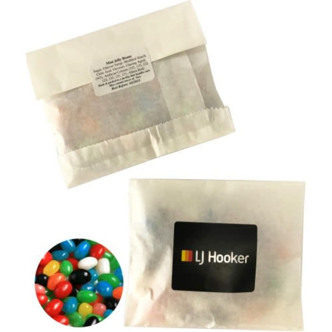 A kraft paper bag containing mini jelly beans in various colours, featuring a logo on the front.