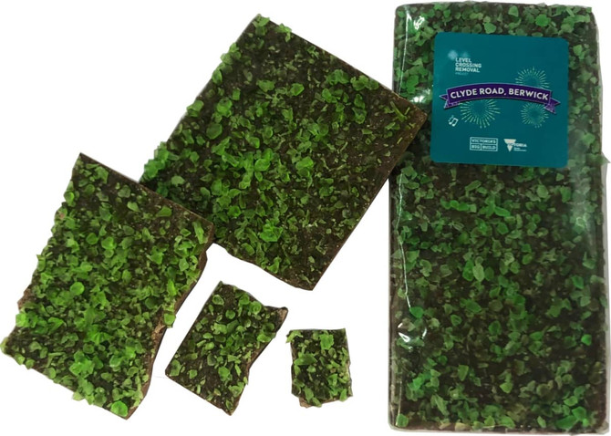 Premium Chocolate Peppermint Crystals in green and dark brown packaging, featuring pieces of peppermint chocolate.