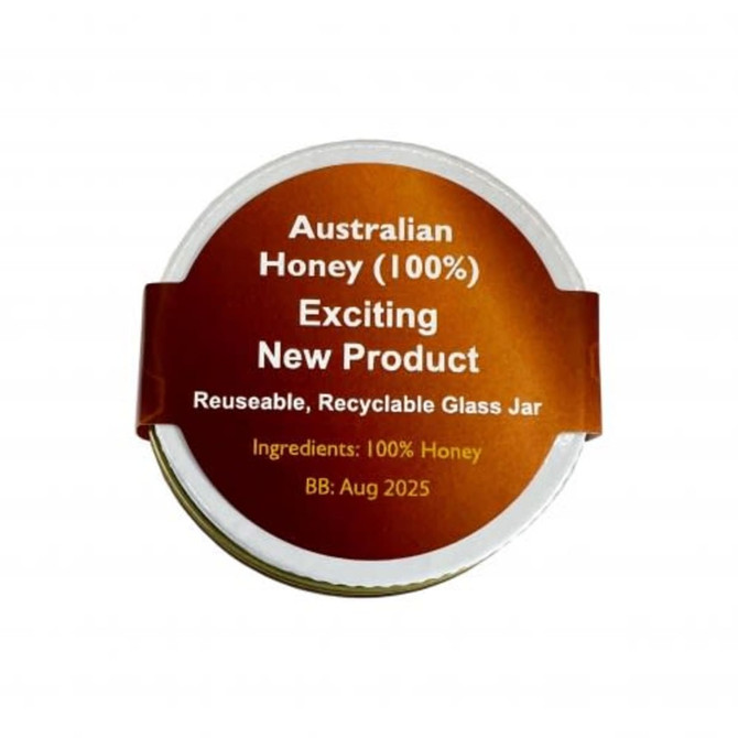 A glass jar of Australian honey with a brown and gold label, featuring a logo and recyclable details.