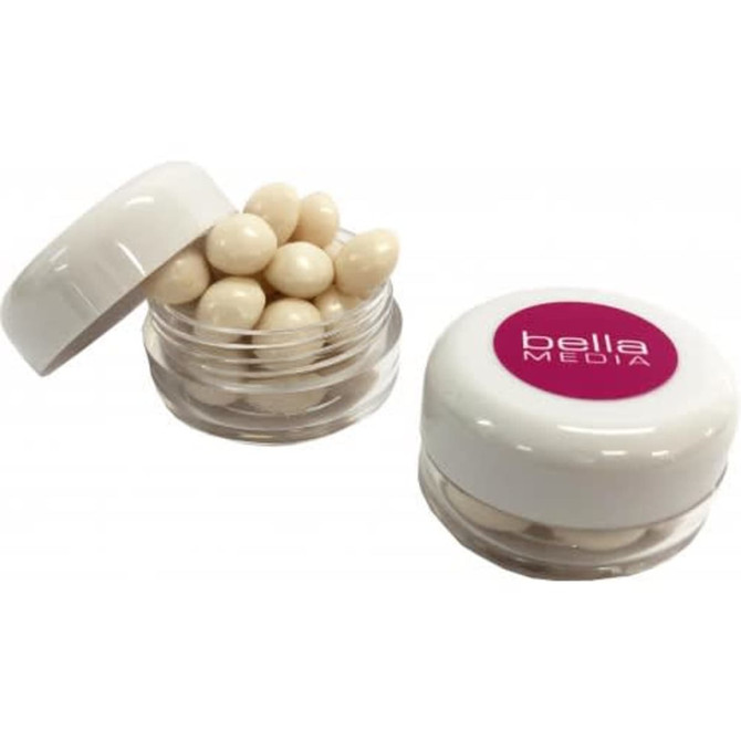 Small transparent screw cap jar containing white mints, with a lid featuring a logo.