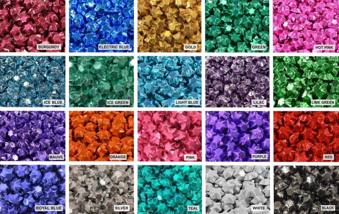 A vibrant assortment of coloured foils in various shades, including electric blue, gold, and hot pink, arranged in squares.