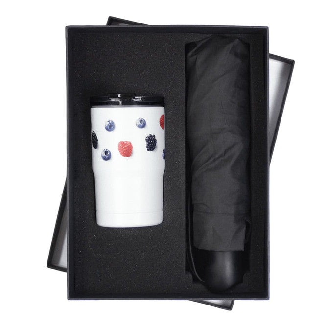 An umbrella and a white tumbler with colourful berry designs, presented in a black gift box.