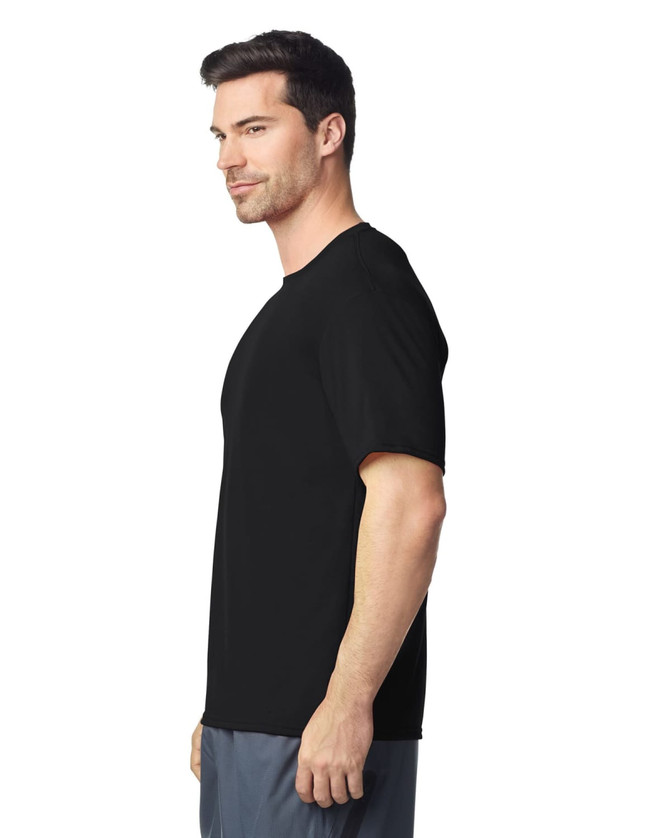 A black Gildan Performance adult T-shirt displayed on a male model from the side, featuring short sleeves.