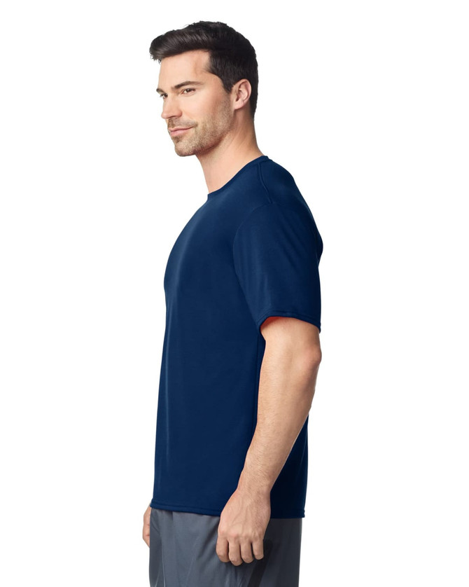 A navy blue Gildan Performance adult t-shirt displayed on a male model, featuring a logo.