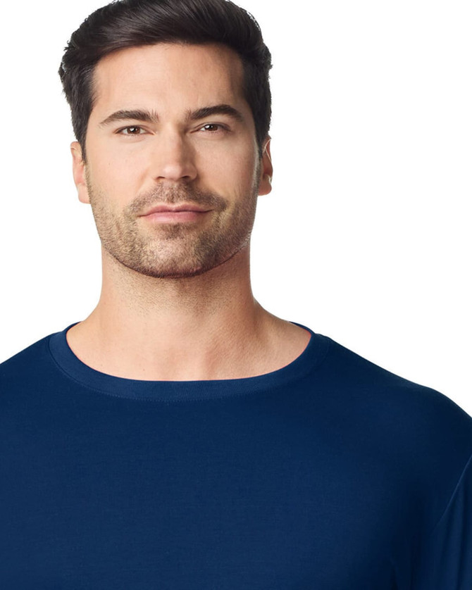 A navy Gildan Performance adult t-shirt worn by a man, featuring a crew neck and minimal branding.