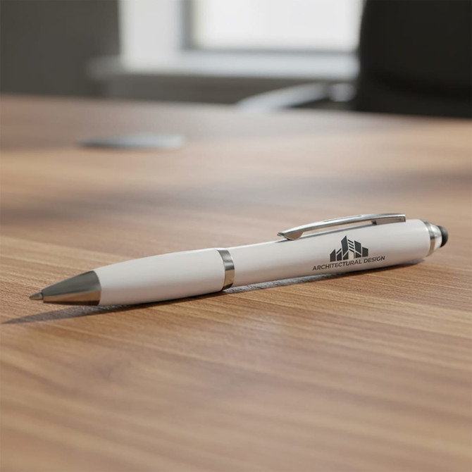 A white stylus pen with a silver clip resting on a wooden table, featuring a logo on its body.
