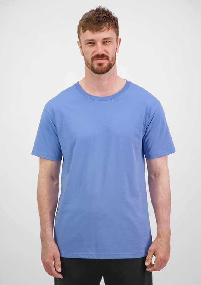 A short sleeve tee in a light blue colour, featuring a logo and worn by a male model.