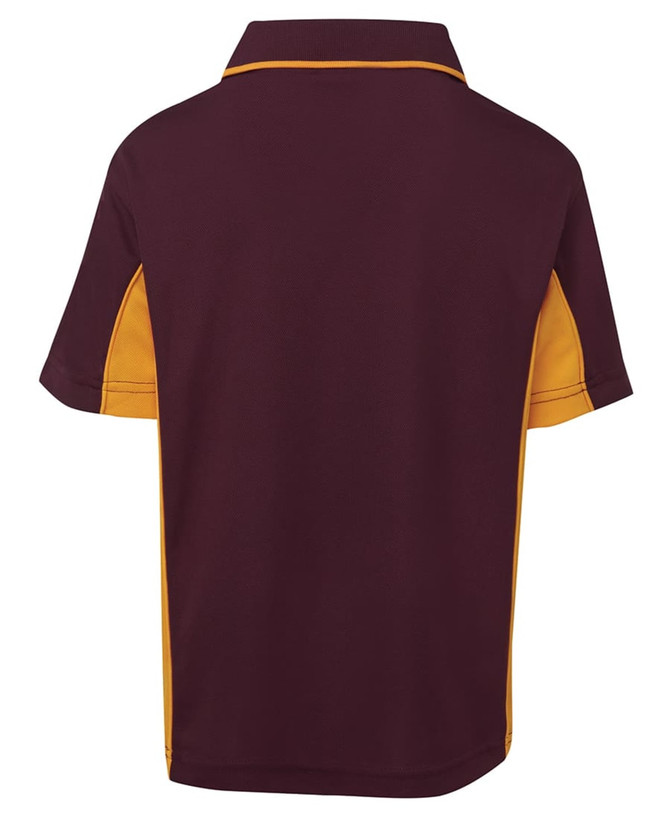 A maroon and gold polo shirt featuring a logo, designed for kids with short sleeves and a classic collar.