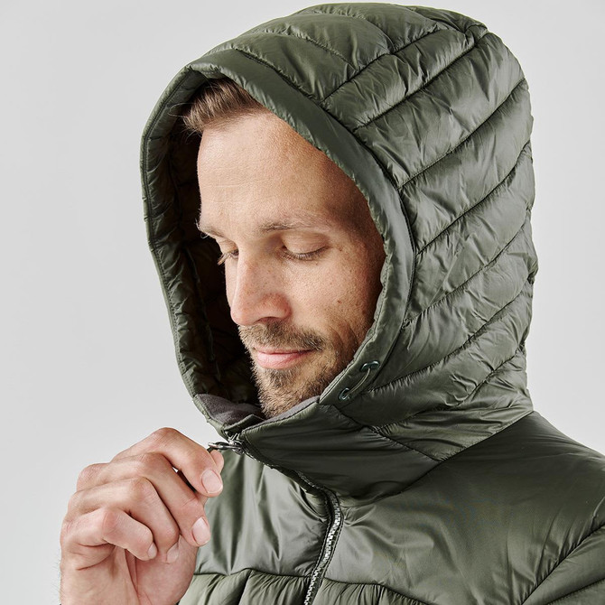 A puffer jacket in olive green with a hood, featuring quilted detailing and a zipped closure.