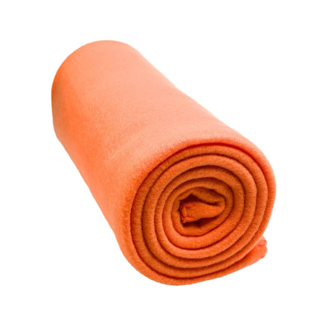 An orange polar blanket, rolled neatly, made from soft fabric.