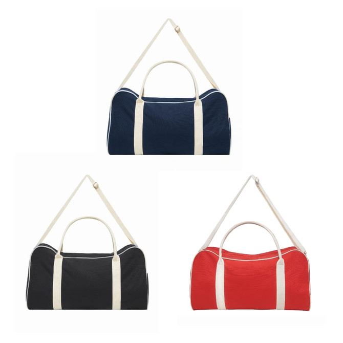 A canvas duffle bag available in navy, black, and red, featuring a light-coloured strap and branding.