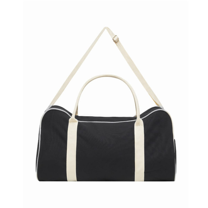 A black and cream two-tone canvas duffle bag with a shoulder strap and dual handles, featuring a logo.