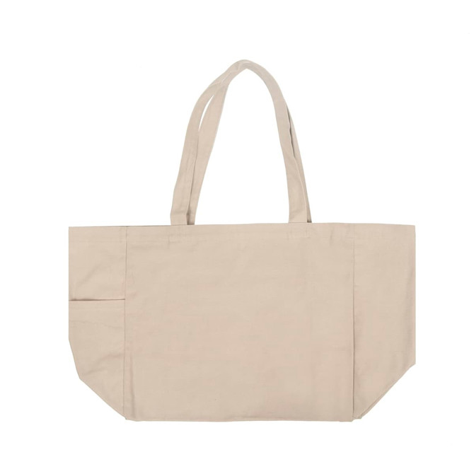 A natural beige canvas tote bag with long handles and a side pocket. Features a logo.