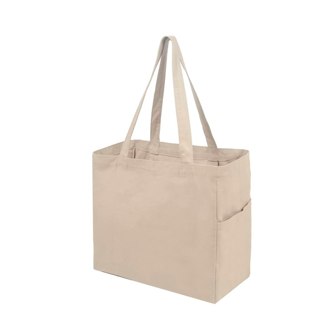 A natural-toned canvas tote bag with sturdy handles and a side pocket, featuring a logo.