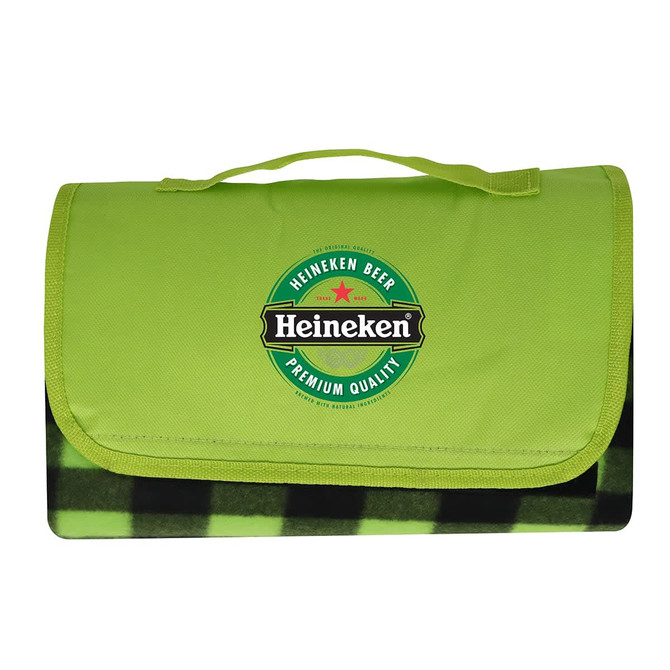 A green picnic blanket with a checkered black and green underside and a logo on the top.