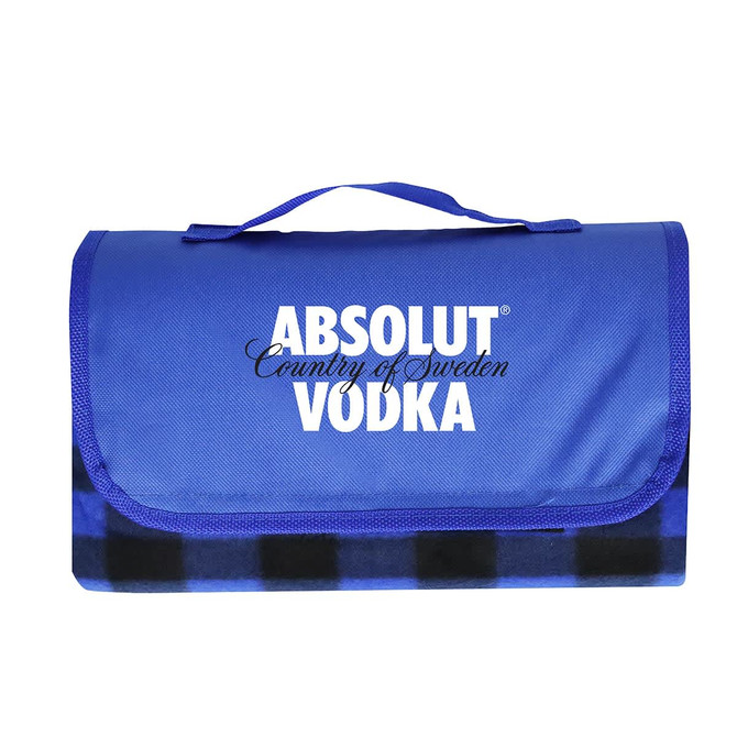 A blue picnic blanket with a checkered pattern, featuring a logo on the front. It has a convenient carry handle.