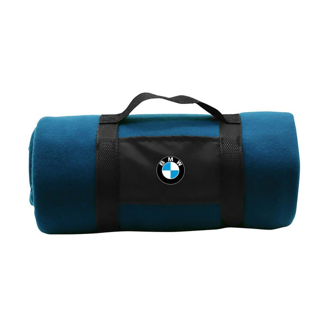 A teal blanket rolled and secured with a black strap featuring a logo. Ideal for home or outdoor use.