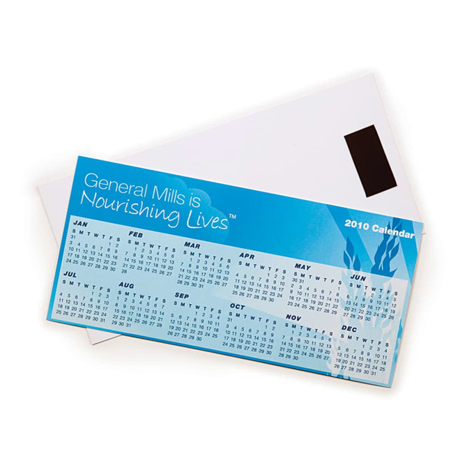 A magnetic calendar featuring a blue design with months listed from January to December. It includes a logo.