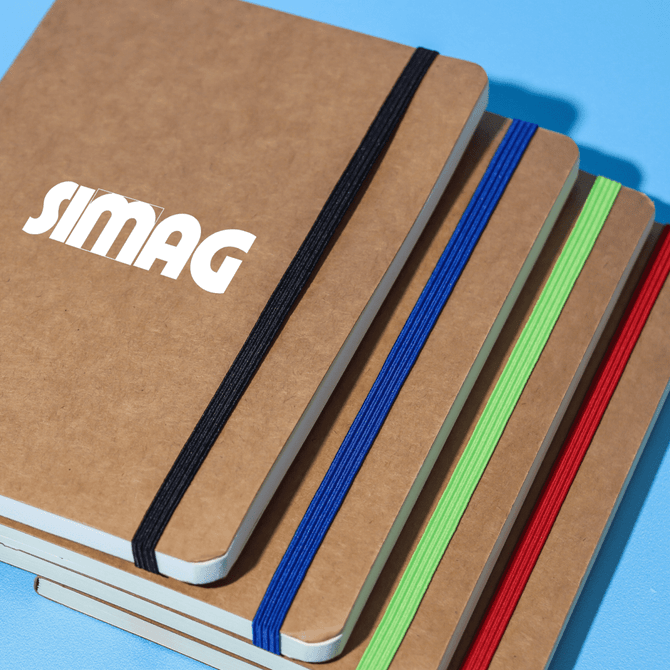A stack of brown notebooks with colourful elastic bands in blue, green, and red, featuring a logo on the front.