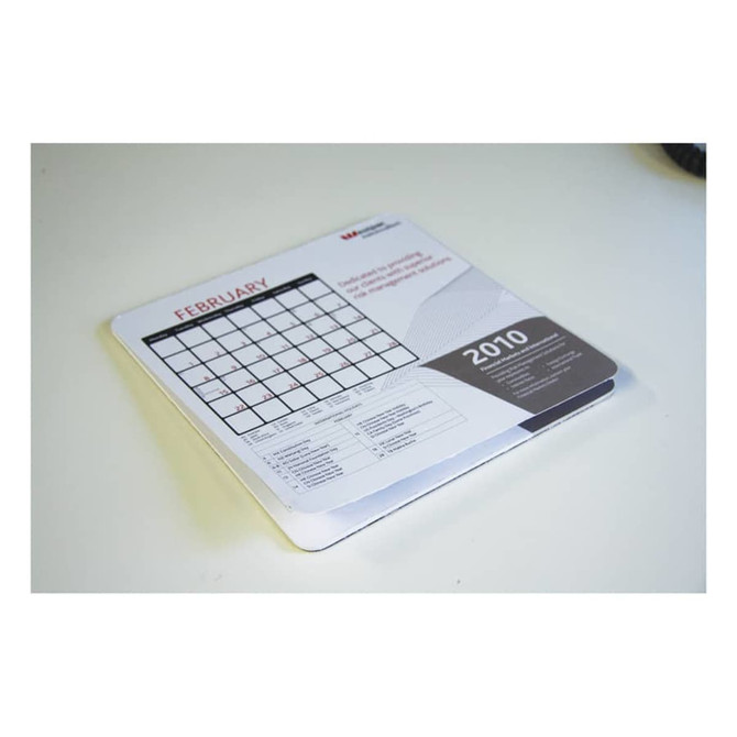 A mouse mat featuring a calendar for February 2010, predominantly white with grey accents and a logo.