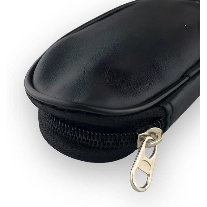 A black case featuring a zip closure, designed to hold multiple brushes. It has a sleek, smooth surface.