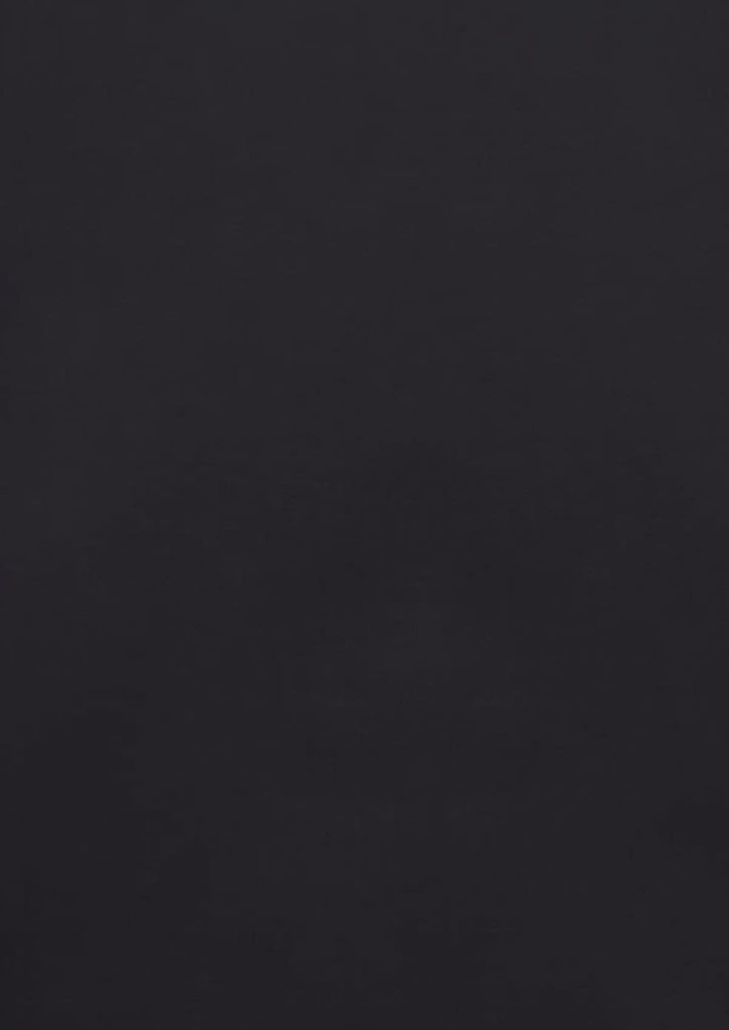 A plain black long sleeve button-up shirt with a slim fit design and a logo on the label.