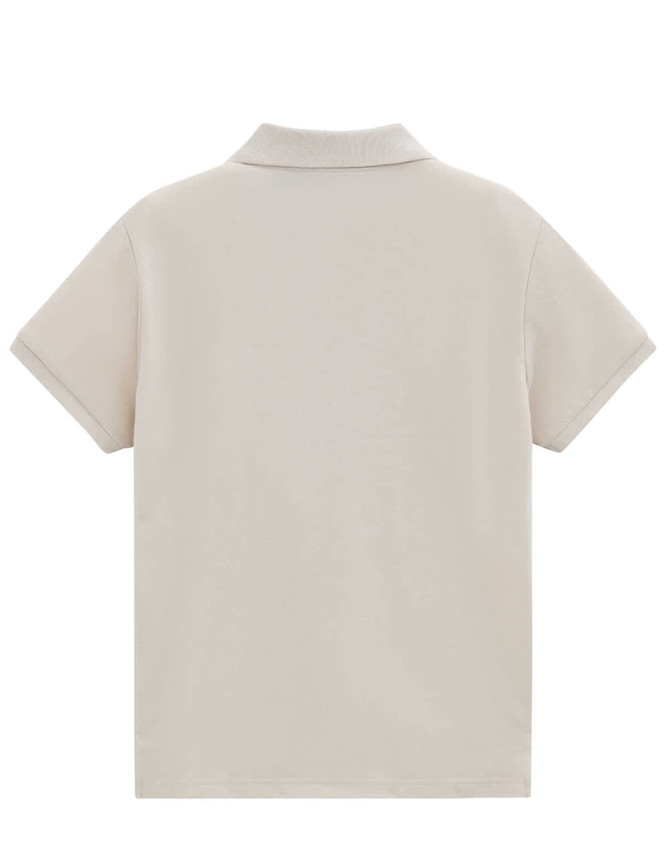 A light beige ladies' short-sleeve polo shirt with a collar, featuring a logo on the back.