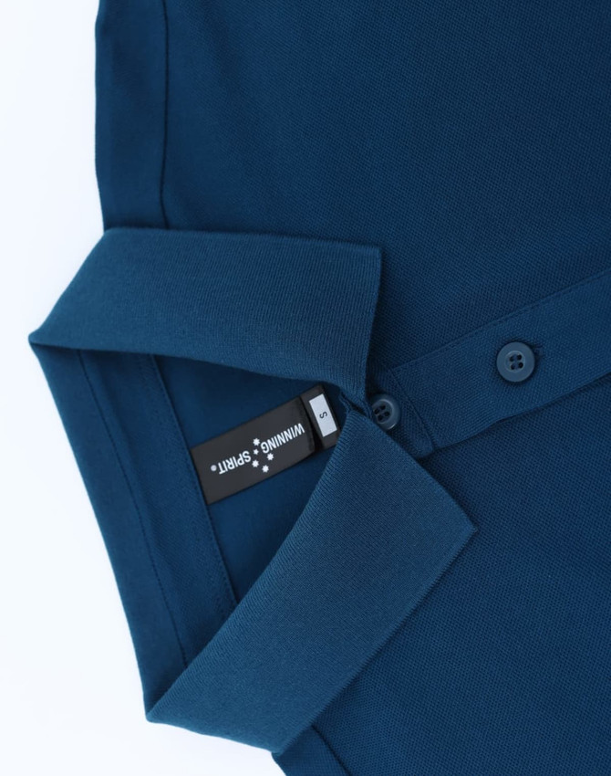 A navy men's ultrafine cotton pique polo with a folded collar and button detail, featuring a label inside.