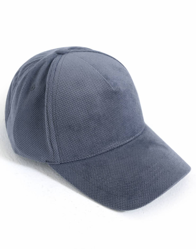 A dark blue Jacquard Texture 5 Panel Cap with a textured fabric and a curved brim.