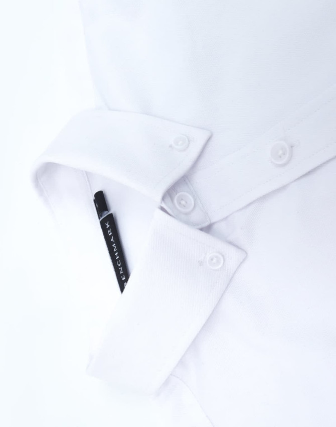 A white men's smart casual long-sleeve shirt featuring button details and a pocket with a pen.