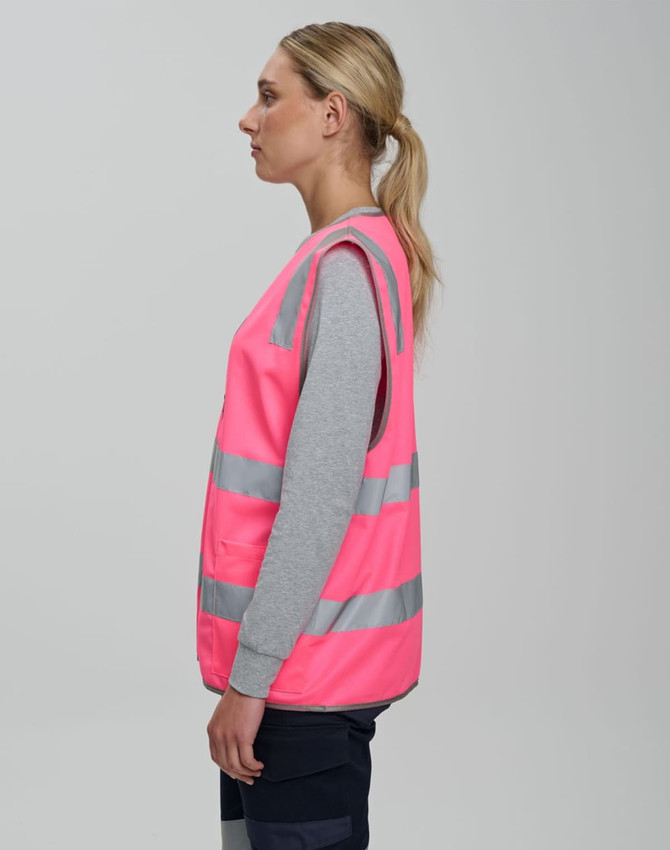 A pink Hi Vis safety zip vest with reflective stripes and utility pockets, displayed on a model from the side.