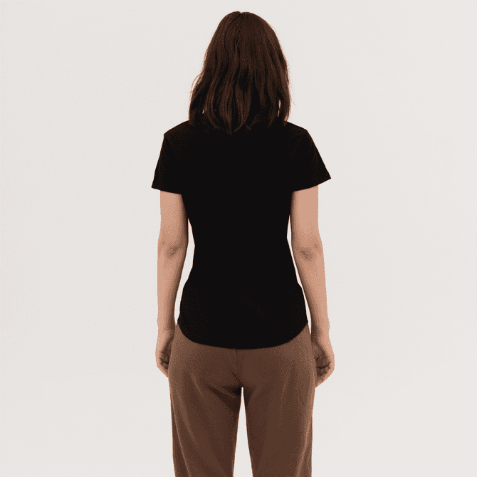 A black women's essential tee is displayed, featuring a simple design and a fitted silhouette from the back.